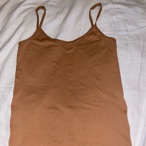 Size S/M reversible tank top. Spandex type fabric and a tighter fit.